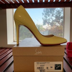 Beautiful Baby Yellow Loubuitons!! Barely worn!